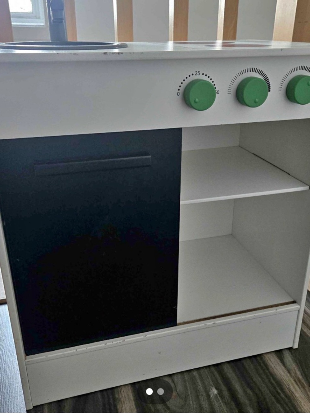 White and Black Toy Kitchen with Green Knobs